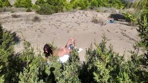 Stranger on a Nudist Beach