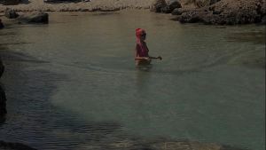 Pink bikini in a beautiful bay