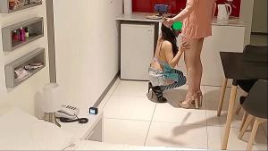 Latina brunette eats banana in the kitchen and sucks a big cock
