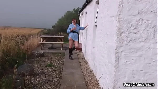 Huge tits mature Allison masturbates outdoors on the table