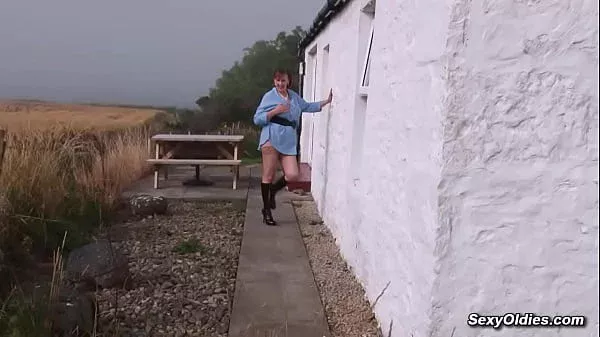 Huge tits mature Allison masturbates outdoors on the table