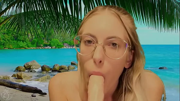 She sucks dildo on beach