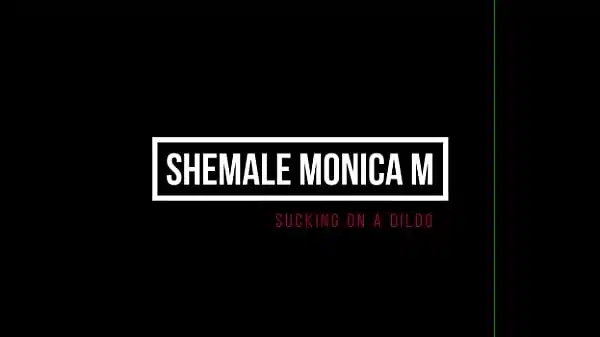 Shemale Monica M – sucking on a dildo