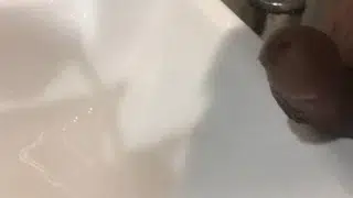 Professional handsome office guy strokes his cock after pissing to relief himself from stress