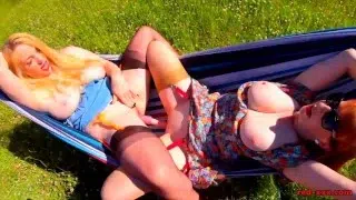 Red XXX and Lucy Gresty enjoy a picnic outdoors