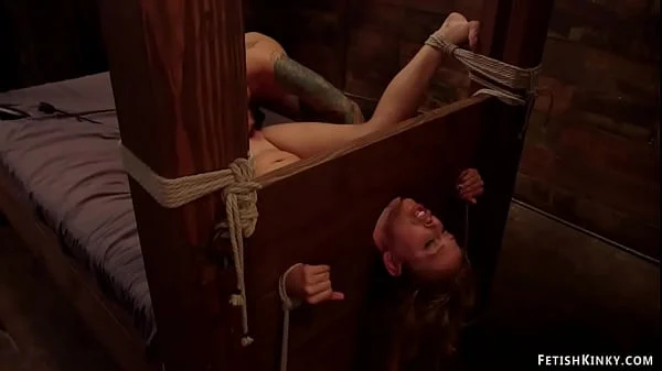 Blonde in wooden stock rough banged