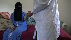 A Muslim girl is disturbed when her American doctor pulls down his pants