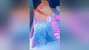Thick Latina Bombshell In Pink Stockings Side View