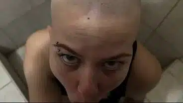 Bald chick blows a dick in the club Party restroom