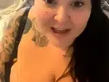 Brunette with big boobs masturbates