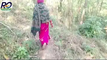 Desi village bhabhi went for a walk in the forest and showed her pussy, breasts and ass by lifting her saree and inserting brinjal in it. Hindi audio player like this