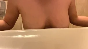 Redhair girl is masturbating wet pussy in public toilet