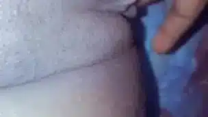 Sexy lesbian fingering her creamy pussy